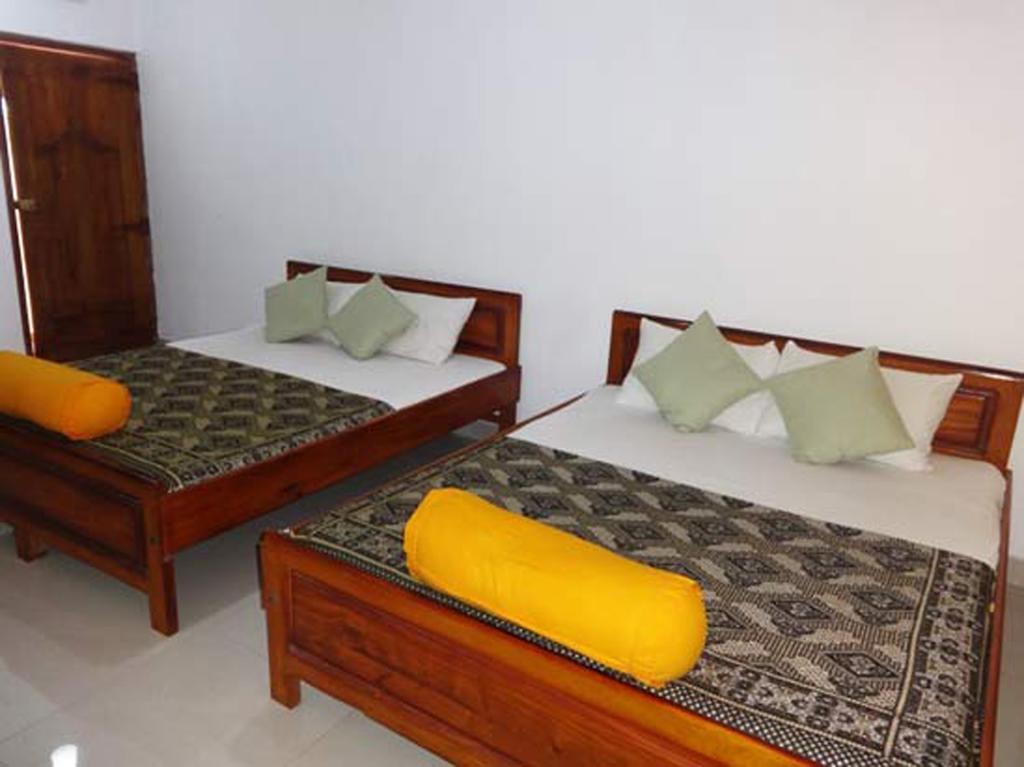 Dutch Bay Beach Cottages تريكونامالاي الغرفة الصورة
