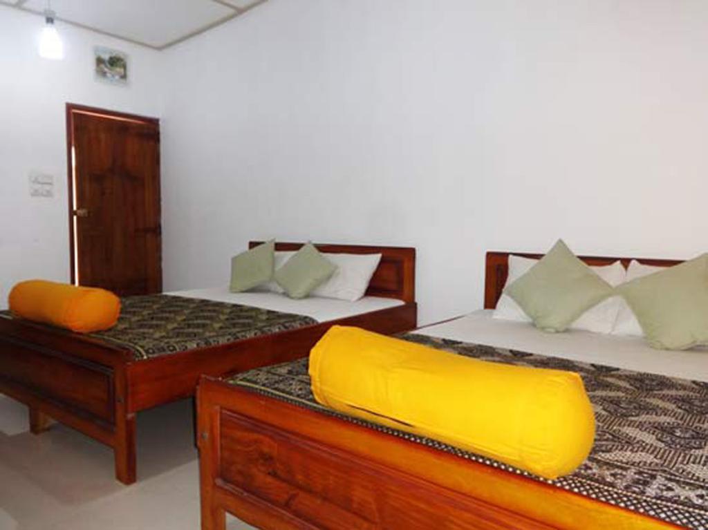 Dutch Bay Beach Cottages تريكونامالاي الغرفة الصورة