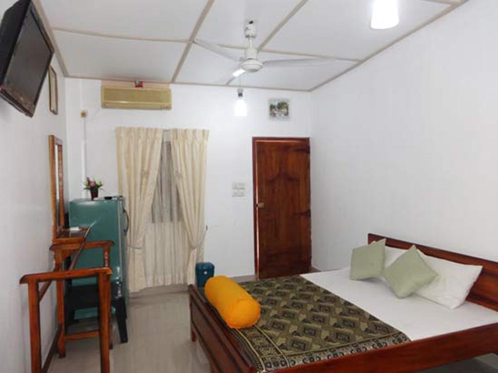 Dutch Bay Beach Cottages تريكونامالاي الغرفة الصورة